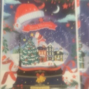 Puzzle by Pieces and Peace. 500ct. Santa’s Snow Village